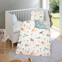 Kinderbettwäsche mit Tieren aus Afrika in weiß-blauem Design mit Wendeseite