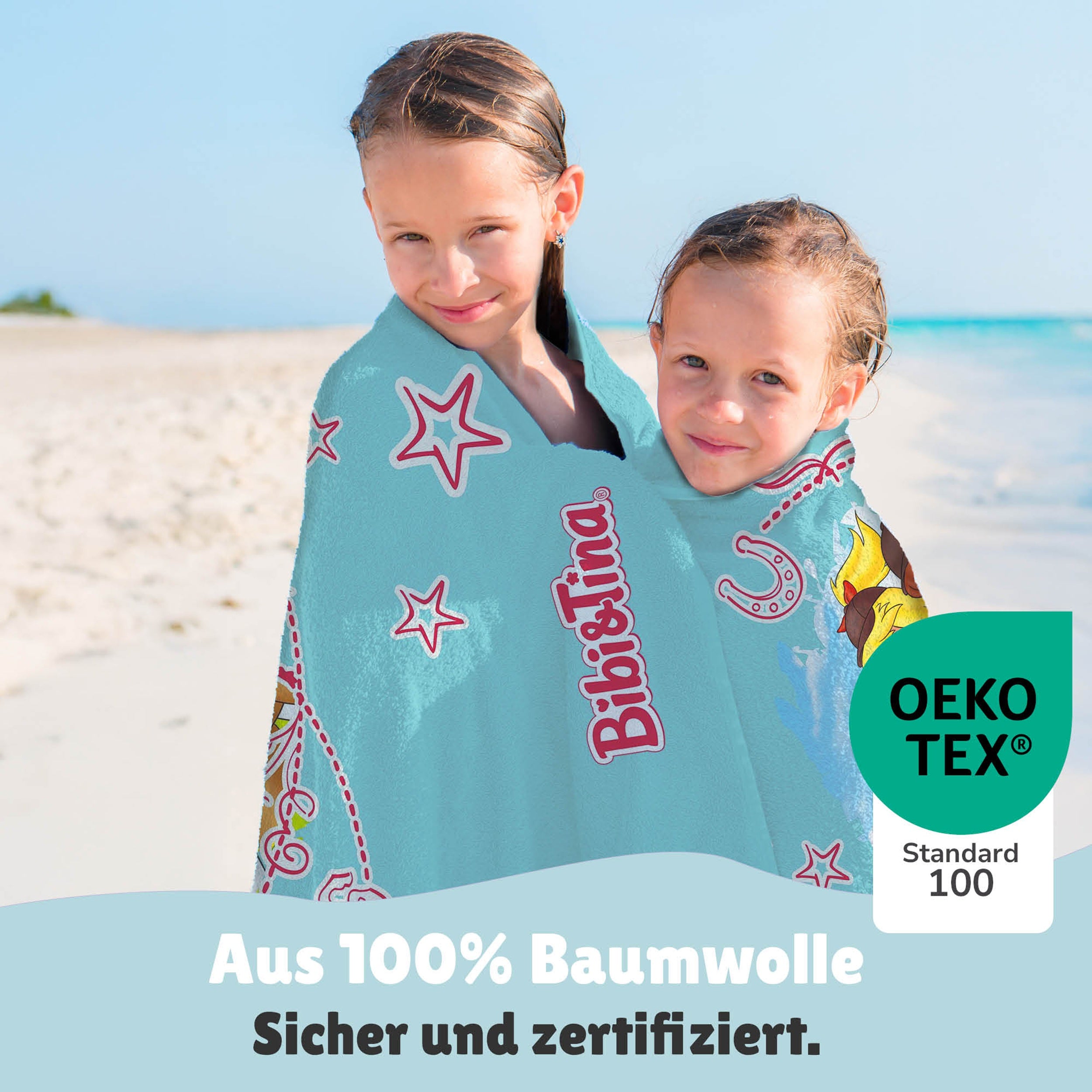 Infotafel Strandlaken aus 100% Baumwolle mit zwei Mädchen in Bibi & Tina Handtuch gehüllt