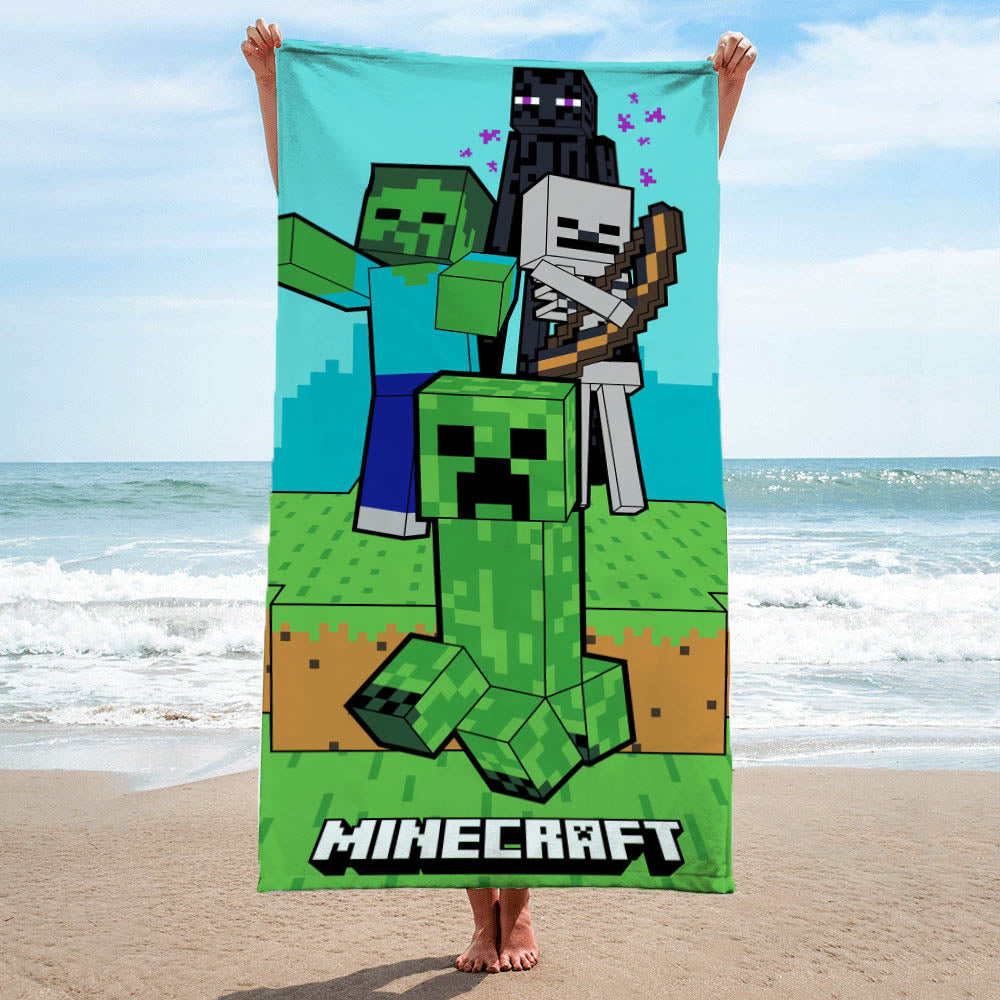 Minecraft Strandtuch 70x140 cm für Jungen in Grün und Blau mit Schriftzug unten, Creeper und Zombies in Pixel Optik mittig