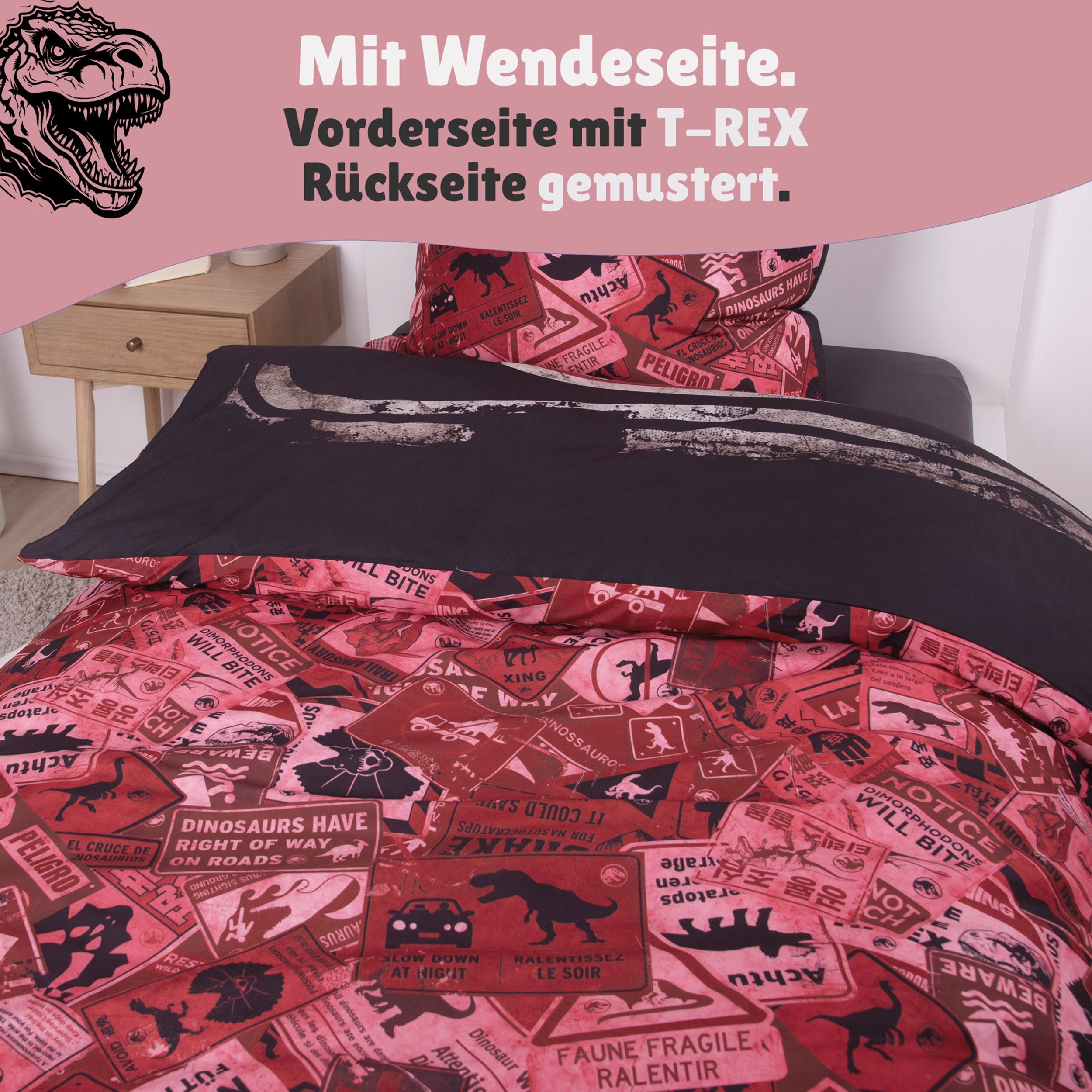 Detaeilansicht rote Wendeseite mit Muster aus Schildern und T-Rex Silhouetten