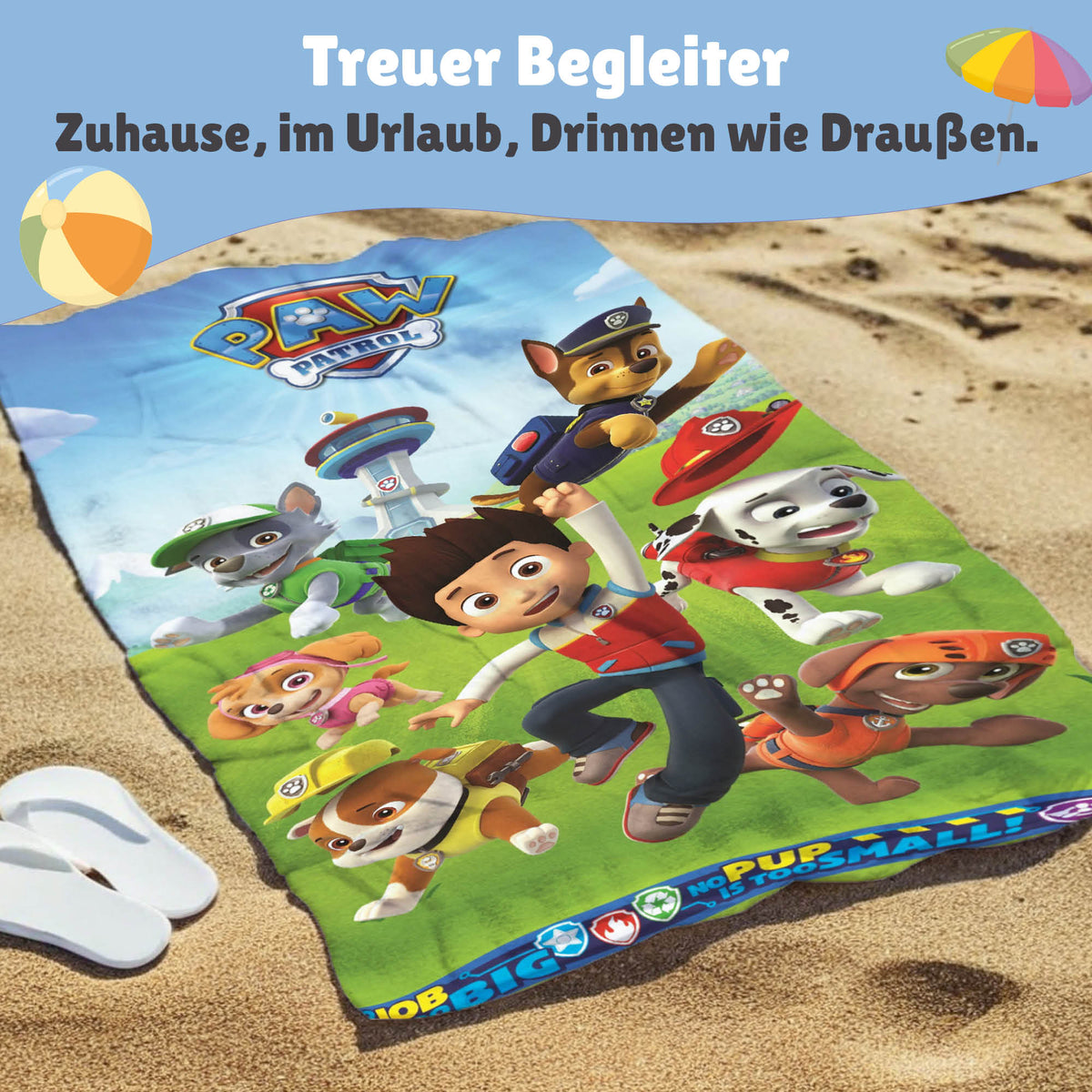 Paw Patrol Strandtuch liegt auf Sand