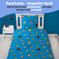 Detailansicht Rückseite blau mit Muster aus Münzen, Pflanzen, Schildkrötenpanzern und Pilzen